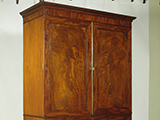 Repaired and refinished armoire
